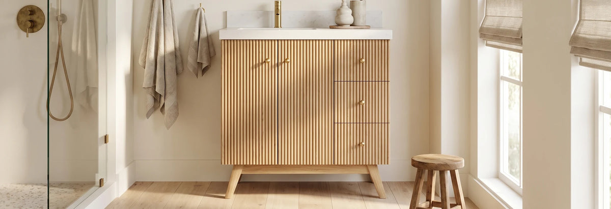 Pasadena White Oak 36 in. left offset sink vanity with brass knobs on splayed board legs, in a California casual bathroom