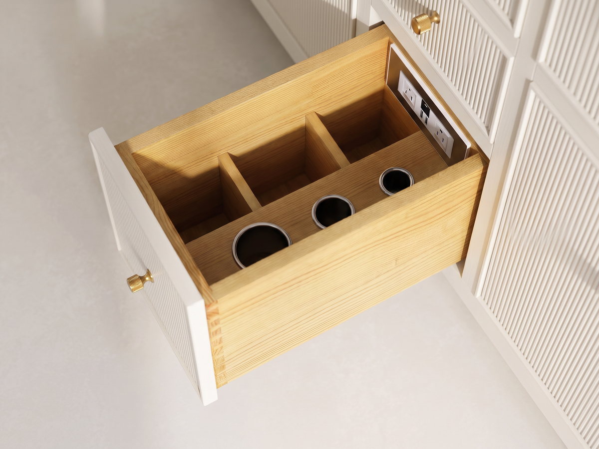 Sonoma Alabaster vanity detail showing the pull-out power station drawer, three metal holders and wooden storage compartments