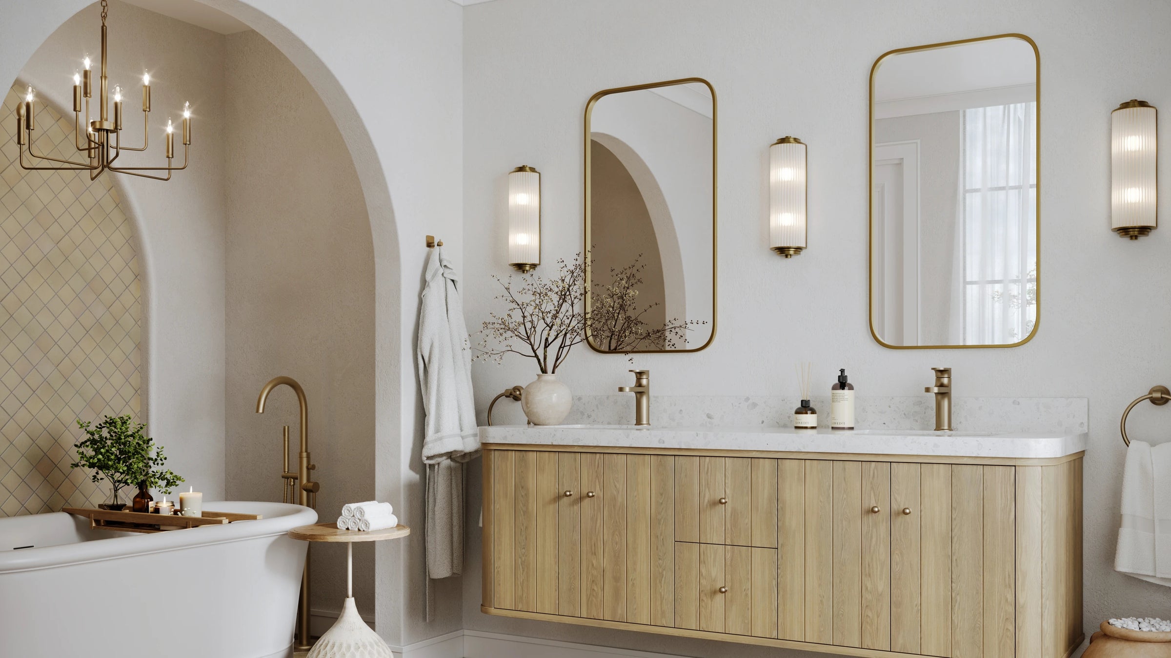 Houston 72 inch white oak floating double sink bathroom vanity with brushed brass fixtures and terrazzo top in a warm Mediterranean bathroom — Willow Bath and Vanity