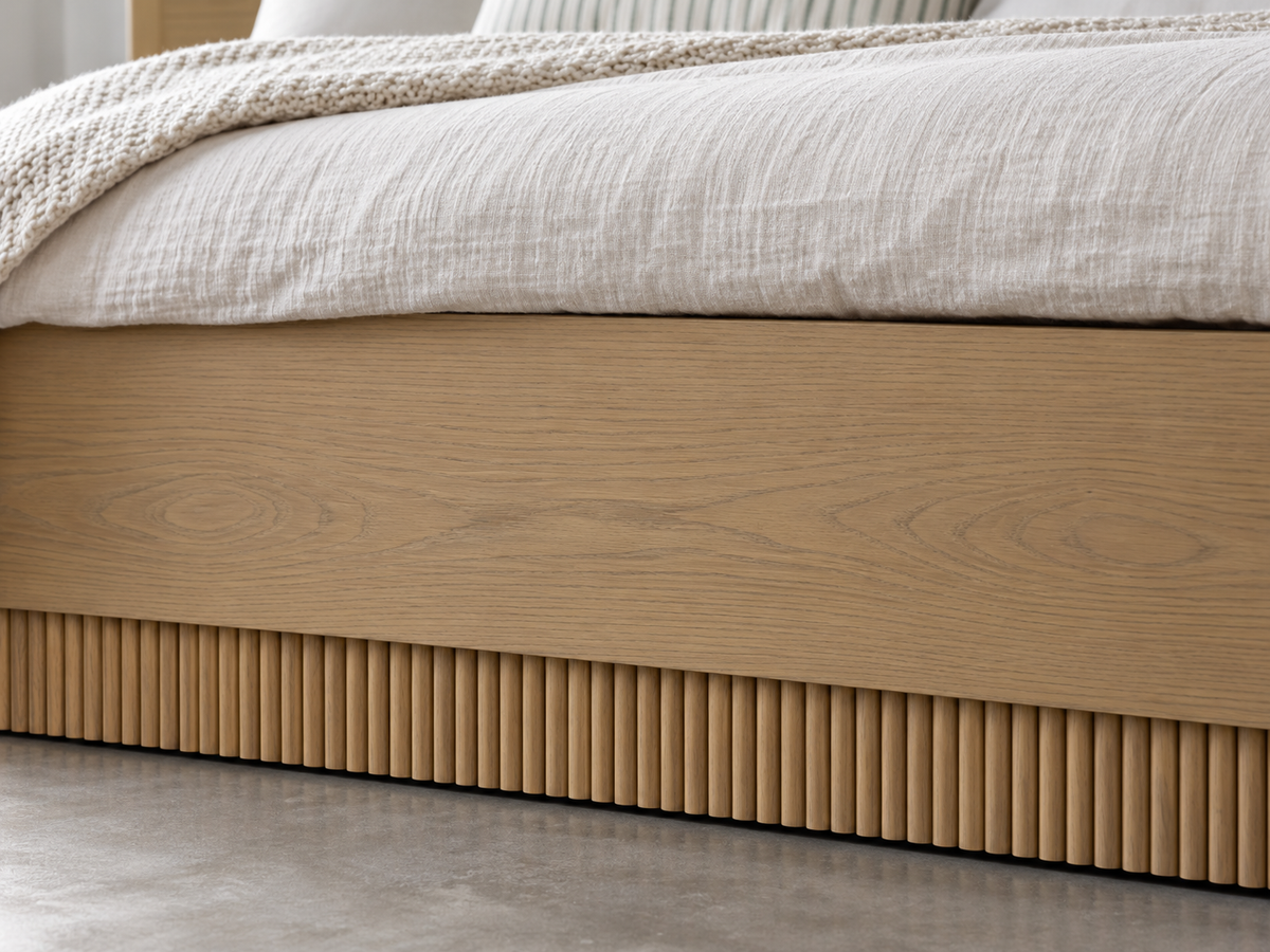 Houston Bed in Nordic White Oak — rendered smooth oak footboard and round-reeded base detail. Mattress, bedding and other furnishings not included.