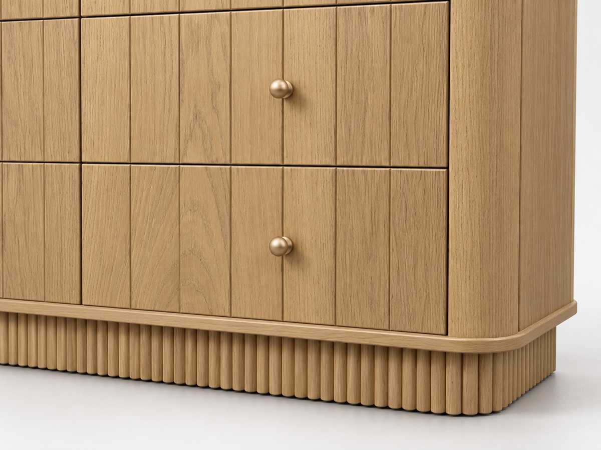 Detail rendering of Houston 50-inch Dresser in Nordic White Oak showing oak grain, brass knob, rounded corner and reeded base