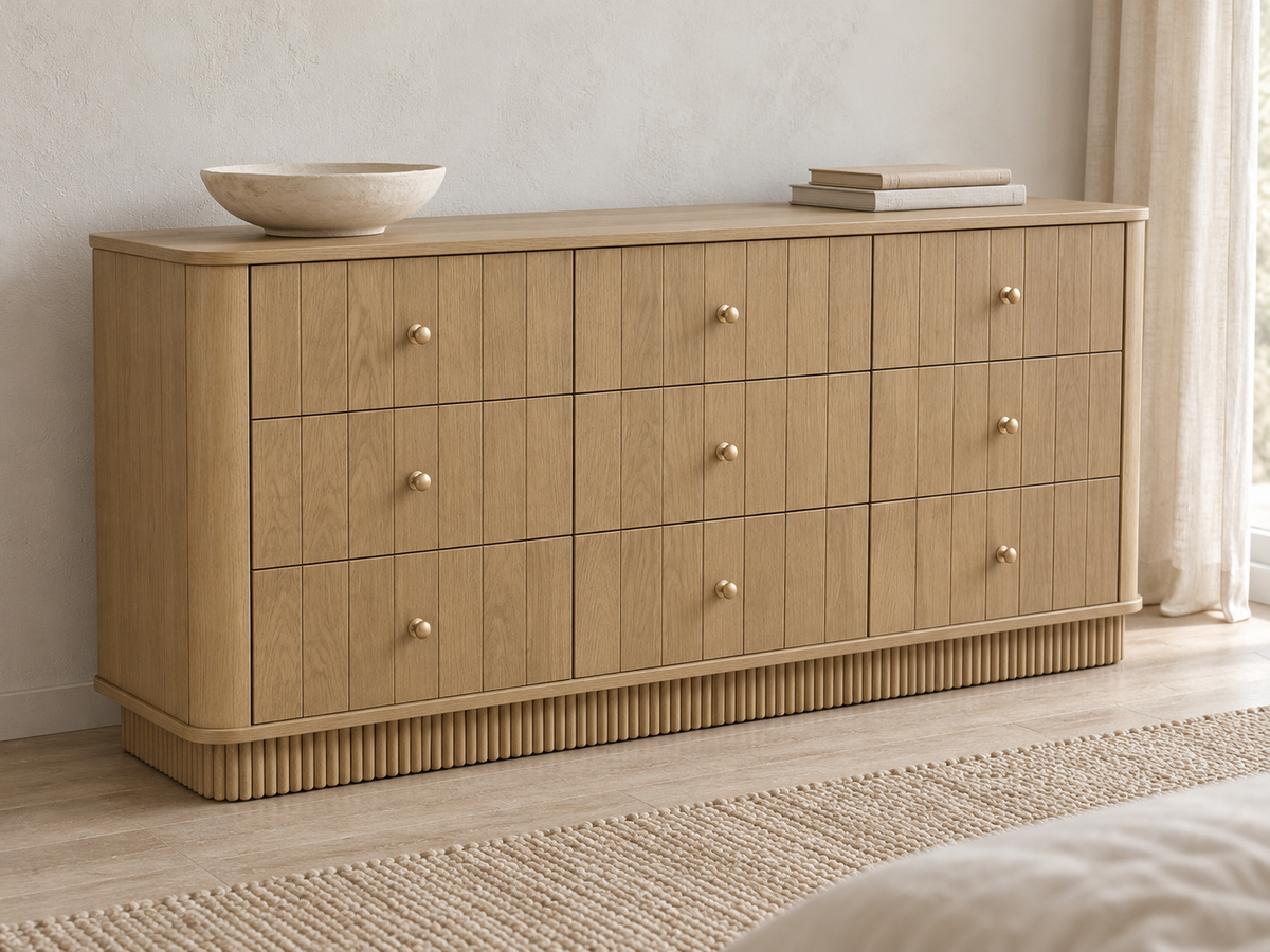 Houston 72-inch nine-drawer dresser in Nordic White Oak — alternative rendered bedroom view from a three-quarter angle.