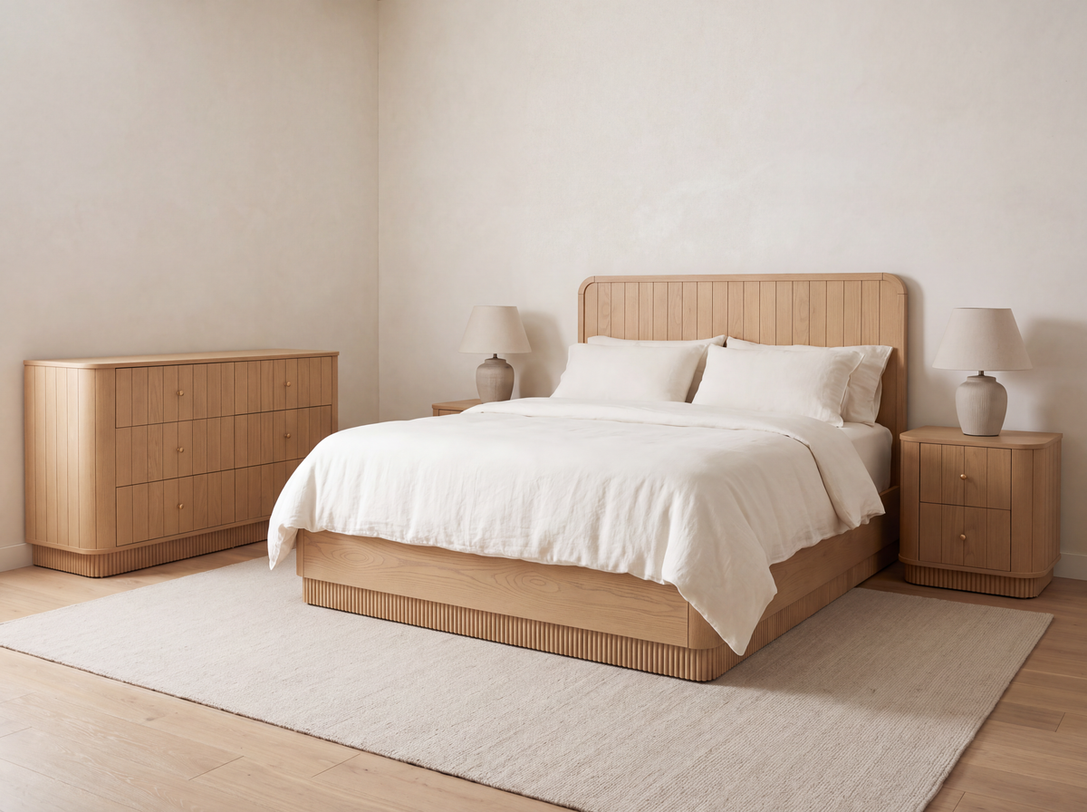 Houston Bed in Nordic White Oak, styled with coordinating rounded nightstands and six-drawer dresser. Other furnishings sold separately.